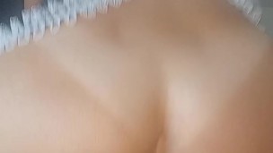 Maid having fun in the kitchen while cleaning