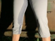 Babe drenches her yoga pants behind dumpster 13/16