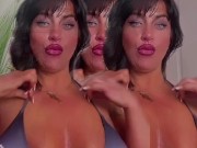 Milf rubs big natural tits together with oil 15/16