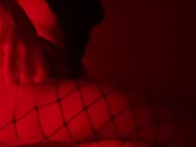 Girl in fishnet tights masturbates with fingers and brings herself to shaking orgasm