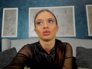 Her deep brunette hair clings to her wet skin, glistening in the light as droplets run down her bod 9/16