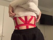 red outfit looks sexy on that brunette. 1/16