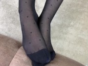 Foot mistress loves to rub her feet in black nylon stockings 15/16