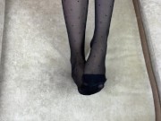Foot mistress loves to rub her feet in black nylon stockings 6/16