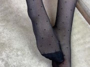 Foot mistress loves to rub her feet in black nylon stockings 8/16