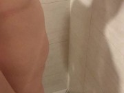 Asian model pees and soaps up in shower 3/16