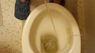 Long morning piss from long cut cock