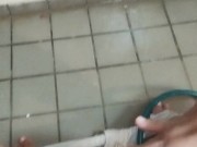 Cleaning the balcony playing with the water hose and get horny 13/16