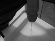 Taking a quick piss on the shower floor, with my semi hard cock 6/16