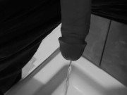 Taking a quick piss on the shower floor, with my semi hard cock 8/16