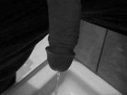 Taking a quick piss on the shower floor, with my semi hard cock 9/16