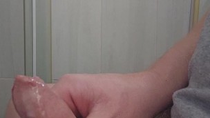 Wanking my uncut cock until I push out some thick cum
