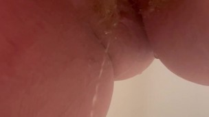 Wife takes a long piss in the shower