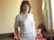 Charming brunette gracefully swaying her hips, showing off her appetizing forms. 10/16