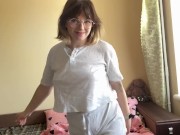 Charming brunette gracefully swaying her hips, showing off her appetizing forms. 8/16