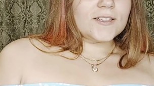 juicy redheaded girl in a gorgeous dress