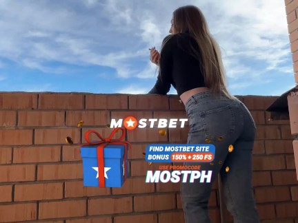 Step sister smokes on the balcony, takes off her jeans and lets her pussy get fucked