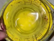 Girl measures her morning piss and overflows the cup 16/16