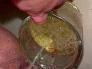 Girl measures her morning piss and overflows the cup 6/16