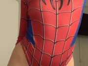 a beautiful girl in a spider-man costume 4/16