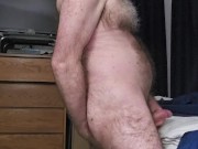 Stroking hard cock and cumming.