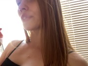 Pretty girl licking her fingers. 11/16