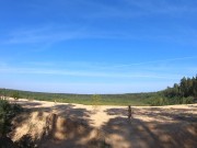 Nude girl walks in a sand quarry 1/16