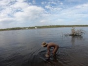Nude girl and melon on the wild beach 4/16