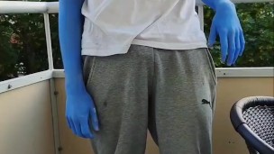 Bodypaint shark teases on balcony