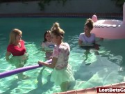 Four skinny ladies in the pool along with their male friend 4/16