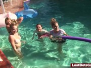 Four skinny ladies in the pool along with their male friend 9/16