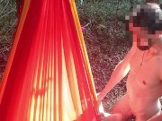 My girlfriend is lying in a hammock and I'm fucking her in the mouth 13/16