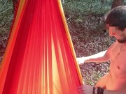 My girlfriend is lying in a hammock and I'm fucking her in the mouth 2/16