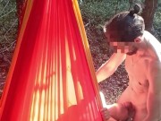My girlfriend is lying in a hammock and I'm fucking her in the mouth 7/16