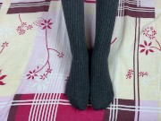 Girl in gray long socks on her legs caresses herself in bed 11/16