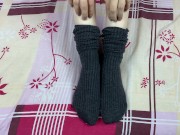 Girl in gray long socks on her legs caresses herself in bed 12/16