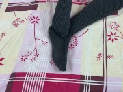 Girl in gray long socks on her legs caresses herself in bed 5/16