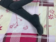 Girl in gray long socks on her legs caresses herself in bed 6/16