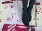 Girl in gray long socks on her legs caresses herself in bed 8/16