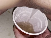 Girl pisses in red solo cup 5/16