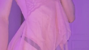 Naughty femboy in transparent nightie shows her chastity cage and tiny ass