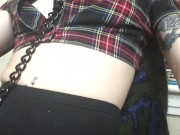 girl wearing chain and leash