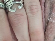 Rubbing stretching pulsing pink pussy in bath close up 10/16