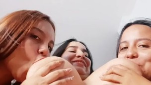 Andrea and Esther suck on big tits