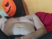 Man in Halloween mask and nylon tights pleasuring himself... 2/16