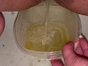 Babe does close up piss in Tupperware container 5/16