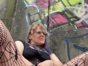 MILF fucks herself by busy mall 14/16