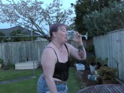 Trashy Kiwi bitch treats you to her pissing in the back yard with close-up view 13/16