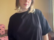 Beautiful brunette in a t-shirt shows off her panties 1/16