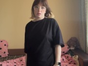 Beautiful brunette in a t-shirt shows off her panties 9/16